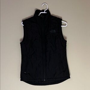 woman’s lightweight North Face vest